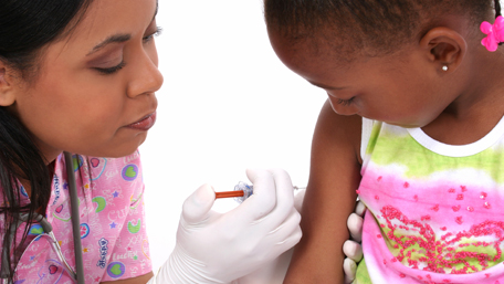 a girl getting a vaccine