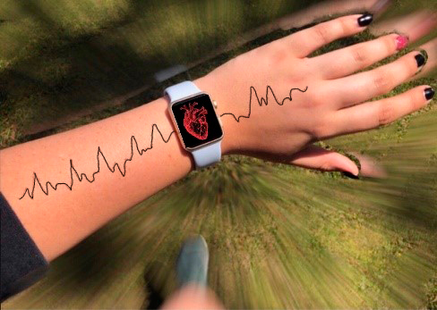 a smart watch on an arm with heartbeats on the arm